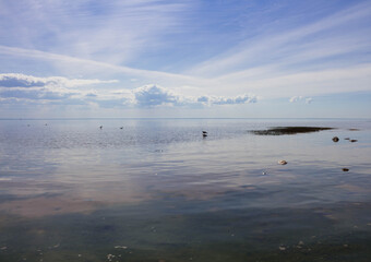 Water surface of the Gulf of Finland against the sky with beautiful clouds...