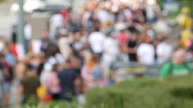 Defocused crowd of people, road intersection crosswalk on The Strip of Las Vegas, USA. Anonymous blurred pedestrians on walkway in crowded urban downtown. Unrecognizable american citizens in sin city.