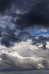 Epic Storm sky, dark grey and white rain cumulus clouds background texture