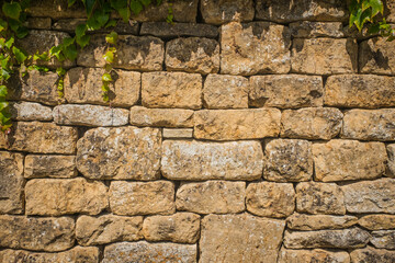 A wall made from traditional English Cotswold stone