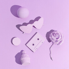 Minimal aesthetic still life monochrome design. Purple colour trends. Audio cassette and objects.