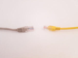 Yellow And Gray Ethernet Cable On Isolated White Background