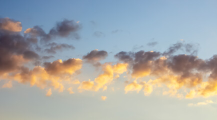 Beautiful sky with clouds in summer at sunset