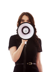 Young businesswoman yelling and shouting over megaphone