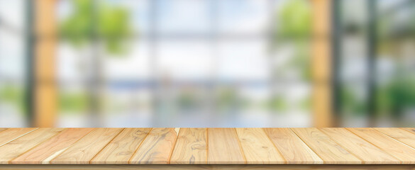 Empty wooden table and blur glass wall background window room interior decoration background,...