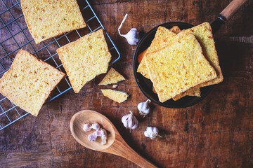 Cook fresh garlic bread from the oven