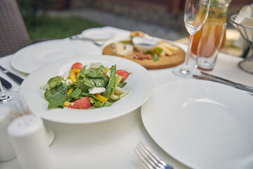 Image of healthy salad on the white plate