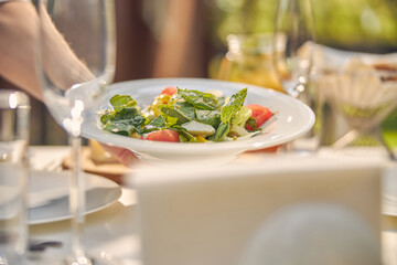 Image of green salad with tomato and peppers