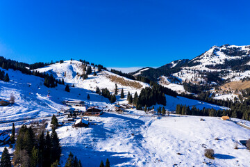 Fototapeta na wymiar Germany, Mangfall Mountains, Upper Bavaria, Bayrischzell region, Oberaudorf, Sudelfeld, ski resort, aerial view