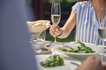 Woman spending time at the lunch time in the restaurant
