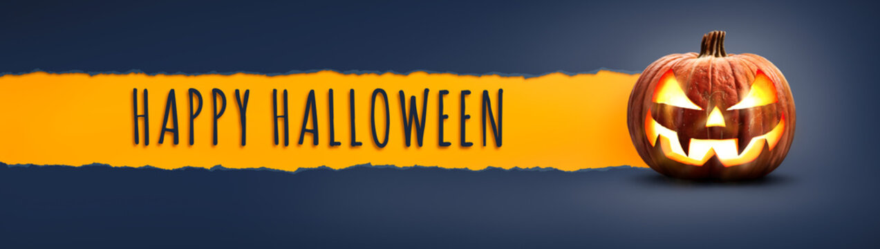 The words Happy Halloween on a textured paper tear with a Halloween Lantern, Jack O Lantern on dark blue banner background