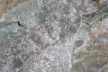 Original textured surface of of a natural coarse stone