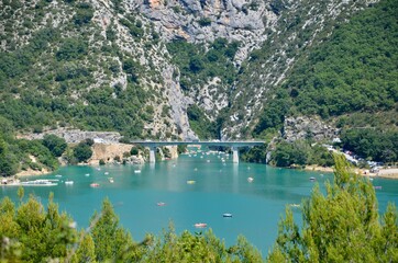 Lac de Sainte-Croix (Lake Sainte Croix) in Provence-Alpes-Côte d'Azur, France, view to the entrance of Verdon Canyon, sunny day in summer, panoramic view