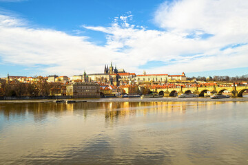 Fototapeta na wymiar Vltava river Prague Charles Bridge view of the small country center, view of the Cathedral of St. Witte Prague Castle. Czech Republic March 2017