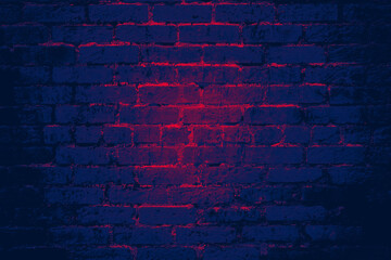 Fototapeta na wymiar Blue brick wall background texture with glowing red light shining through cracks