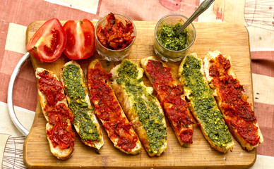 hot chili tomato and pesto sauce, sliced roasted italian ciabatta bread for cooking bruschetta...