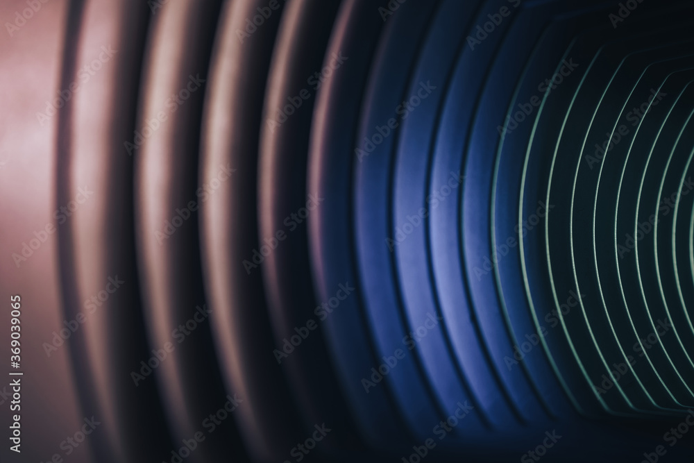 Poster Beautiful abstract gray tunnel with color light on a background.