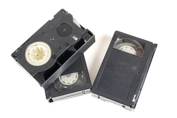 Three video tape cassettes on white background