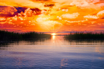dramatic late sunset over the lake Chiemsee in Bavaria, Germany