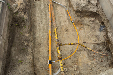 Fenced trench with underground utilities