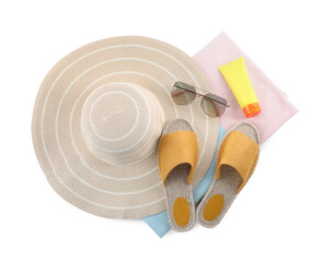 Composition with beach objects on white background, top view