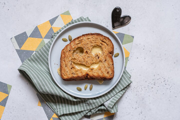 Jack o lantern grilled cheese toast for Halloween