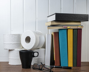 Toilet paper rolls and books