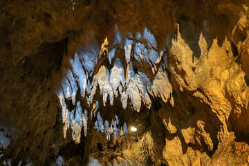 Stalactites and stalagmites inside the Zinzulusa caves in Castro, Lecce, Salento, Puglia, Italy