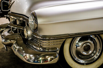 beautiful retro car in silver color.