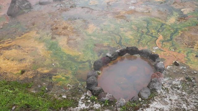 Hot springs, steam and clouds in volcanic valley in North Slope of Changbaishan, which extend from the Northeast Heilongjiang, Jilin and Liaoning, across the border between China and North Korea