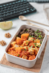 Tofu and sweet potato curry with lentils in lunch box