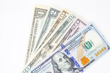 Stack of money American dollar bills on a white background. The concept of buying for dollars