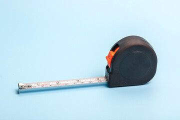Meter stick and worker on blue background
