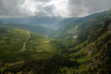 Naklejka premium mountain landscape with clouds