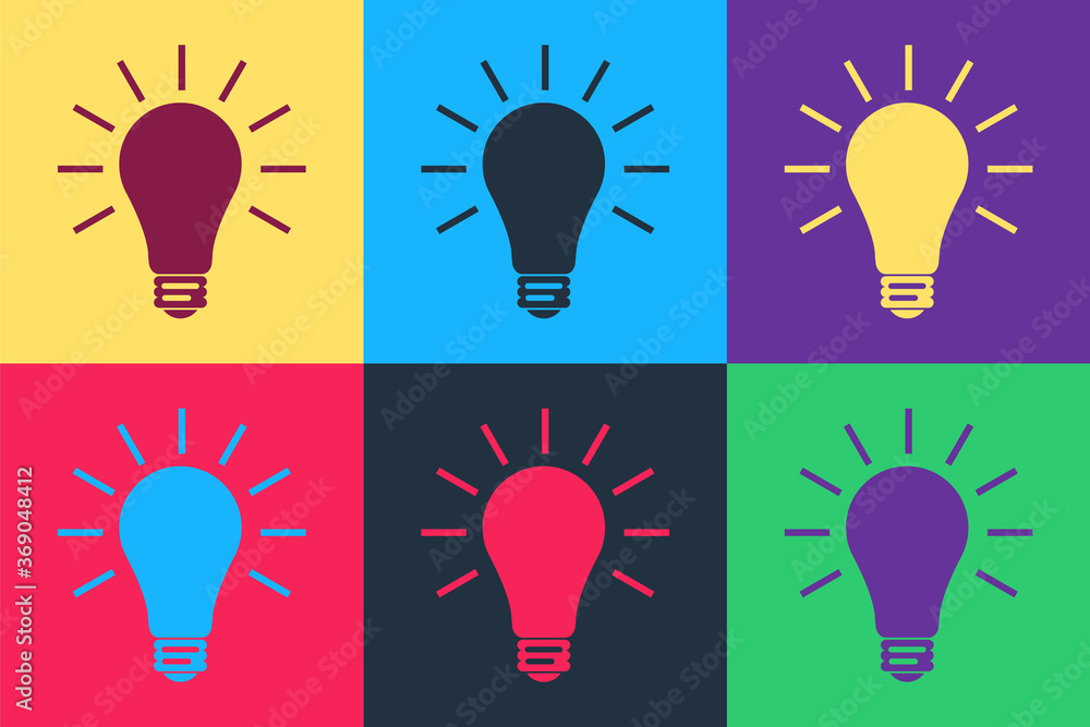 Poster pop art light bulb with rays shine icon isolated on color background. energy and idea symbol. lamp e