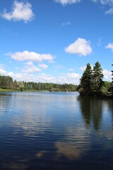 Fototapeta na wymiar Blue Of The Lake, William Hawrelak Park, Edmonton, Alberta