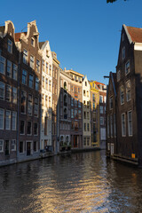 Fototapeta na wymiar Summer canal scenes in Amsterdam, Netherlands