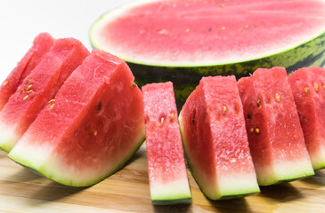 watermelon slices on a chopping board