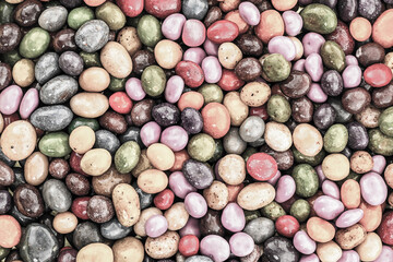 tinted dark background base glazed jelly beans candy yellow frosted lilac