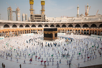 Muslim pilgrims in Al Haram Mosque Makkah performing Tawaf , Hajj Season at the time of the Corona Covid 19 , Covid 19 precautionary measures.Saudi Arabia makkah at Aug 2020 © leo morgen