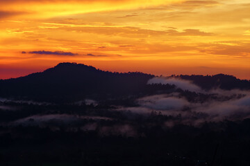 Sunset over mountain at Thung Salaeng Luang National Park