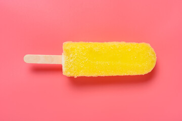 top view fresh yellow popsicle on pink background