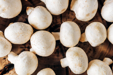 Mushrooms on a wooden background close up