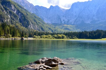 Colorful autumn landscape at lakes Laghi di Fusine (Weissenfelser Seen) in Northern Italy in the...