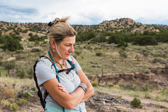 Portrait Of 50 Year Old Woman Hiker On Nature Trail