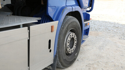 Transport - Blue cab of a large truck. Details of a truck. Logistics.
