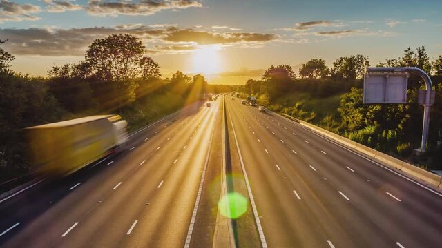 sunset traffic moving on uk motorway in england timelapse