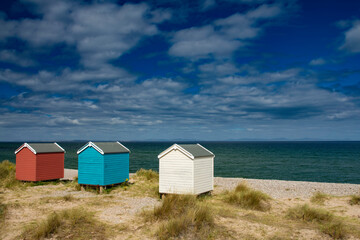 Fototapeta na wymiar beach huts at Findhorn on the Moray coast, Scotland.