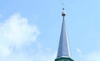 minaret of the mosque. faith islam. moon on the mosque
