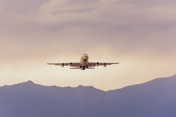 Fototapeta na wymiar Airplane take off at the mountain airport.